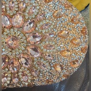 Crystal Bling lux Oval Clutch - Blush Pink. Features gold handle.